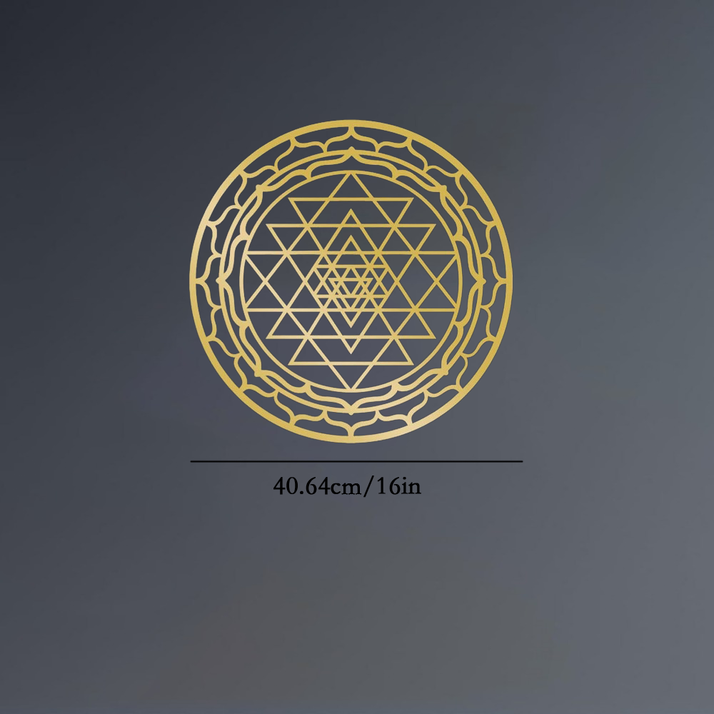 Close view of the hand-cut metal Sri Yantra triangles and lotus ring