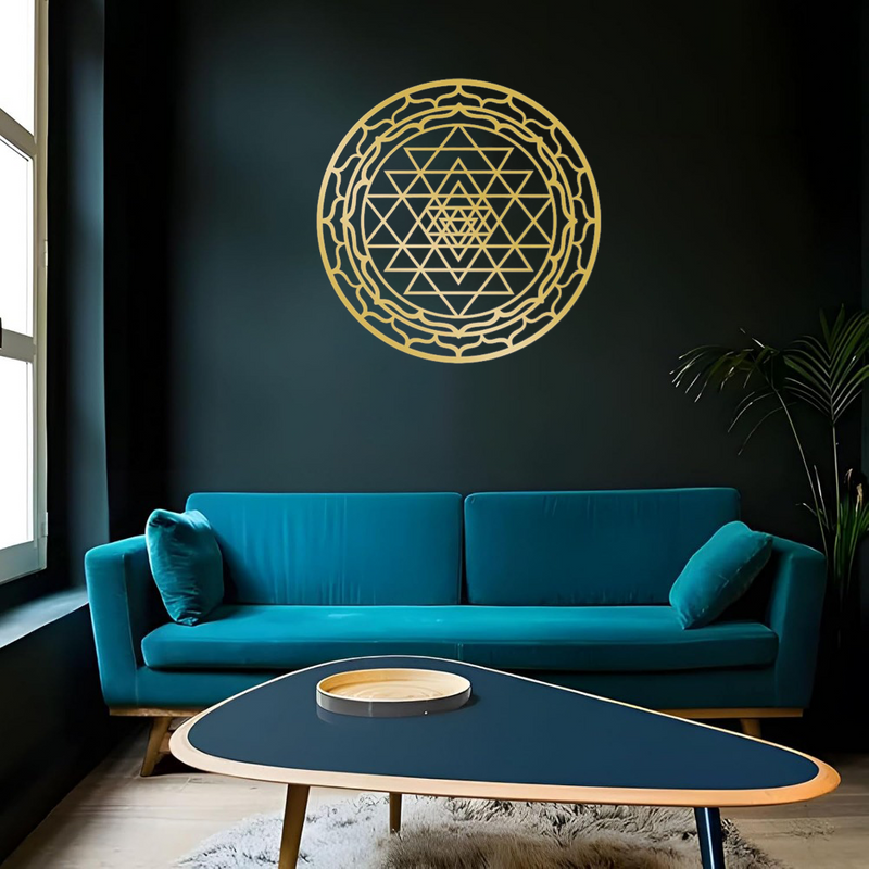 Sri Yantra metal mandala mounted on a wall in a modern interior