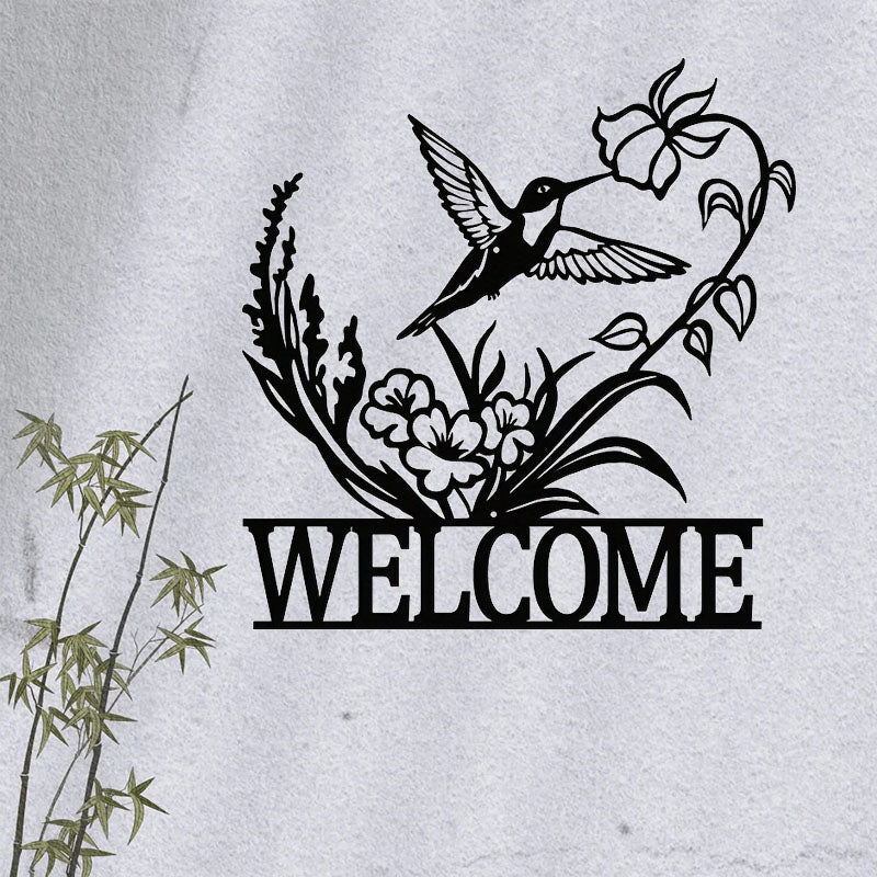 Vintage metal wall art welcome sign styled in an entryway